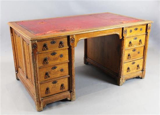 Gillows after a design by A.W.N.Pugin. A Victorian gothic revival oak desk, W. 5ft. D. 2ft 6in. H.2ft 6in.